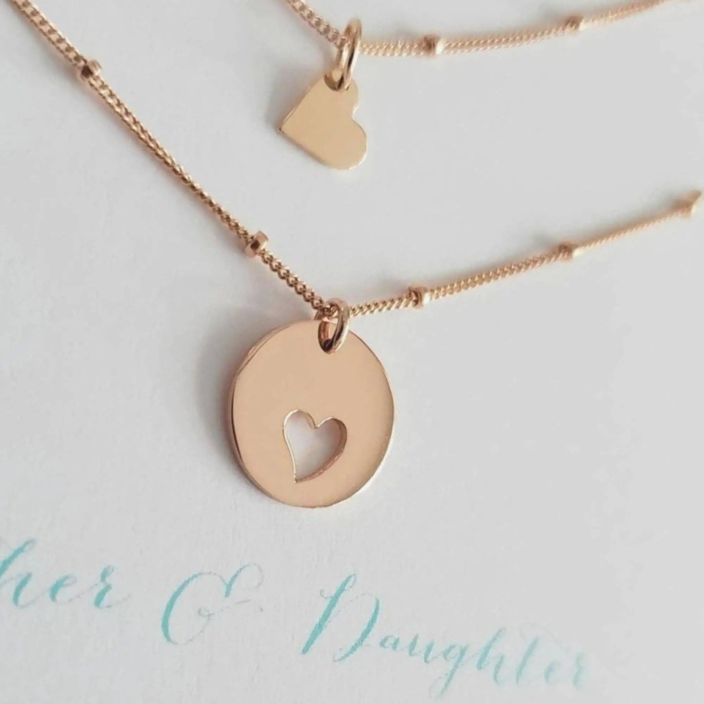 "Mother & Daughter" 2Pcs Circle with Heart Cut-Out and Connecting Heart Puzzle Necklaces Set