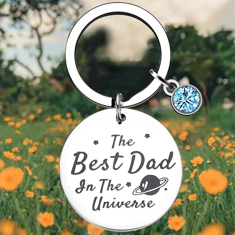 "The Best Dad In The Universe" Engraved Keychain with Blue Stone Charm